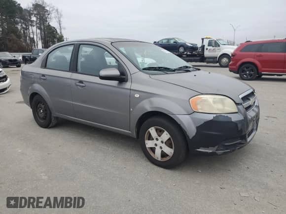 2007 Chevrolet Aveo LS z VIN KL1TD56637B061892, wystawiony jako Copart lot #86140044 z przebiegiem Nie podano mil oraz Szkoda całkowita • Salvage title. Historia ofert i sprzedaży dostępna na DreamBid. Obrazek 4.
