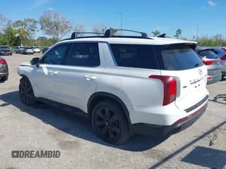 ✅ 2023 Hyundai Palisade XRT • VIN: KM8R34GE8PU560774 • Лот: 41463864. Опубликован ранее на IAAI с пробегом 52 783 миль. Бесплатный доступ к архиву аукционных продаж из США и подробный отчёт об истории автомобиля на DreamBid. Изображение 3.