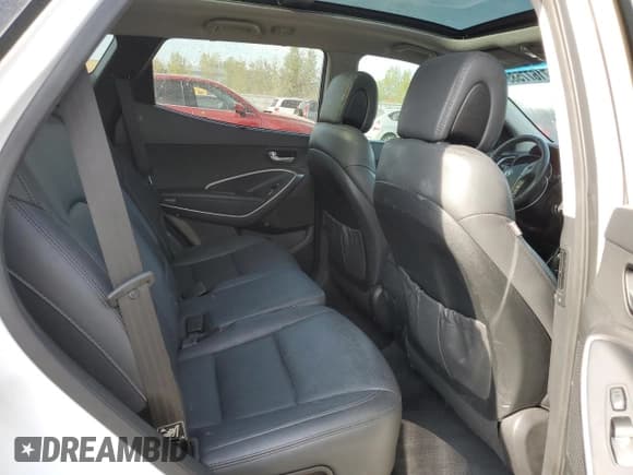 ✅ 2016 Hyundai Santa Fe • VIN: 5XYZUDLBXGG378671 • Lot: 71677585. Listed on Copart with 128,468 mi. Free auction sales archive from the USA and detailed vehicle history report at DreamBid. Image 11.