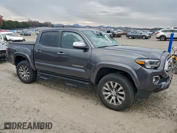 ✅ 2022 Toyota Tacoma Limited • VIN: 3TMGZ5AN2NM481353 • Lot: 93691655. Listed on Copart with 51,820 mi. Free auction sales archive from the USA and detailed vehicle history report at DreamBid. Image 4.