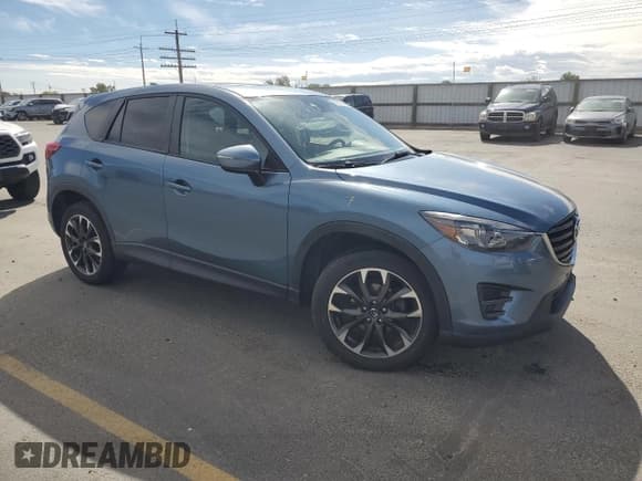 ✅ 2016 Mazda CX-5 Grand Touring • VIN: JM3KE4DY9G0612426 • Lot: 82179145. Wystawiony na Copart z przebiegiem 147 130 mil. Bezpłatny archiwum sprzedaży aukcyjnych z USA i szczegółowy raport historii pojazdu na DreamBid. Zdjęcie 4.