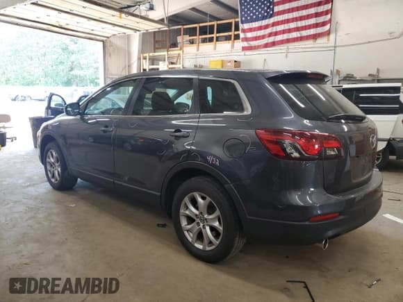 ✅ 2015 Mazda CX-9 Touring • VIN: JM3TB3CA6F0449891 • Лот: 63752895. Опубликован ранее на Copart с пробегом 125 060 миль. Бесплатный доступ к архиву аукционных продаж из США и подробный отчёт об истории автомобиля на DreamBid. Изображение 2.