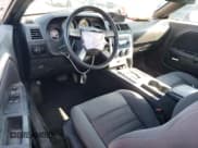 ✅ 2010 Dodge Challenger SE • VIN: 2B3CJ4DV3AH208430 • Lot: 67512574. Wystawiony na Copart z przebiegiem 125 759 mil. Bezpłatny archiwum sprzedaży aukcyjnych z USA i szczegółowy raport historii pojazdu na DreamBid. Zdjęcie 8.