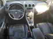 2012 Chevrolet Captiva Sport LT z VIN 3GNAL3E5XCS613703, wystawiony jako Copart lot #83405654 z przebiegiem 128 792 mil mil oraz Szkoda całkowita • Salvage title. Historia ofert i sprzedaży dostępna na DreamBid. Obrazek 8.