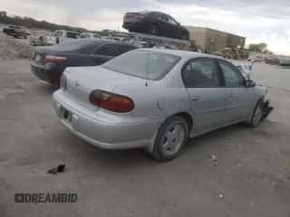 2001 Chevrolet Malibu LS z VIN 1G1NE52J916227544, wystawiony jako Copart lot #71095404 z przebiegiem 136 767 mil mil oraz Szkoda całkowita • Salvage title. Historia ofert i sprzedaży dostępna na DreamBid. Obrazek 3.