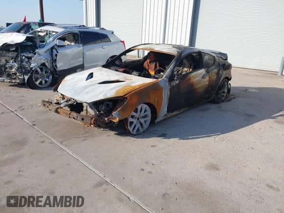 2014 Hyundai Genesis Coupe R-Spec z VIN KMHHT6KD1EU121676, wystawiony jako IAAI lot #41002117 z przebiegiem Nie podano mil oraz . Historia ofert i sprzedaży dostępna na DreamBid. Obrazek 2.