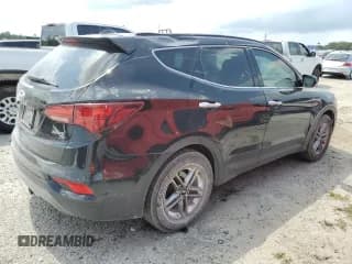 ✅ 2017 Hyundai Santa Fe 2.4L • VIN: 5XYZU3LB9HG389561 • Лот: 57660914. Опубликован ранее на Copart с пробегом 156 229 миль. Бесплатный доступ к архиву аукционных продаж из США и подробный отчёт об истории автомобиля на DreamBid. Изображение 3.