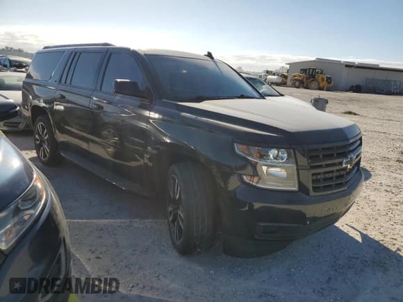 ✅ 2020 Chevrolet Suburban LT • VIN: 1GNSCHKC4LR221954 • Lot: 74828644. Wystawiony na Copart z przebiegiem 163 028 mil. Bezpłatny archiwum sprzedaży aukcyjnych z USA i szczegółowy raport historii pojazdu na DreamBid. Zdjęcie 4.