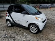 ✅ 2009 Smart fortwo Pure • VIN: WMEEJ31X99K254292 • Лот: 70000045. Опубликован ранее на Copart с пробегом 60 113 миль. Бесплатный доступ к архиву аукционных продаж из США и подробный отчёт об истории автомобиля на DreamBid. Изображение 4.