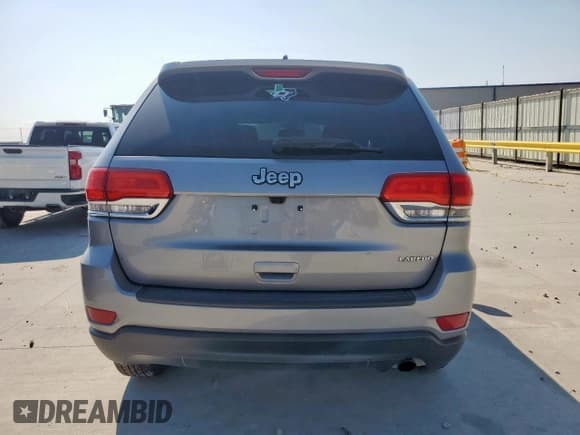 ✅ 2015 Jeep Grand Cherokee Laredo • VIN: 1C4RJEAG0FC137167 • Лот: 71719725. Опубликован ранее на Copart с пробегом 91 537 миль. Бесплатный доступ к архиву аукционных продаж из США и подробный отчёт об истории автомобиля на DreamBid. Изображение 6.