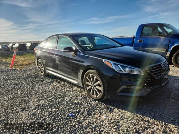 2016 Hyundai Sonata Sport with VIN 5NPE34AF0GH291930, listed as a Copart auction lot 81953825 with 133,681 mi miles and Salvage title. Bid and sale history available at DreamBid. Image 4.