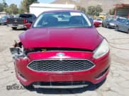 ✅ 2015 Ford Focus SE • VIN: 1FADP3F27FL300543 • Lot: 42228251. Listed on IAAI with 141,233 mi. Free auction sales archive from the USA and detailed vehicle history report at DreamBid. Image 12.