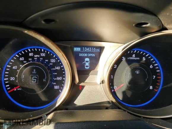 2013 Hyundai Genesis Coupe Track z VIN KMHHU6KJ3DU110955, wystawiony jako Copart lot #87667235 z przebiegiem 134 316 mil mil oraz Szkoda całkowita • Salvage title. Historia ofert i sprzedaży dostępna na DreamBid. Obrazek 9.