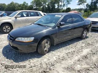 1999 Honda Accord EX with VIN 1HGCG1658XA028099, listed as a Copart auction lot 70496855 with Not provided miles and Salvage title. Bid and sale history available at DreamBid. Image 1.