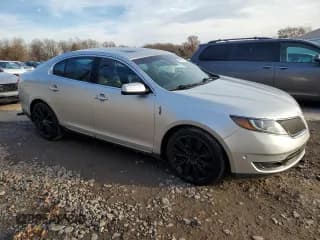 ✅ 2014 Lincoln MKS EcoBoost • VIN: 1LNHL9FT5EG610244 • Lot: 93709735. Listed on Copart with 128,092 mi. Free auction sales archive from the USA and detailed vehicle history report at DreamBid. Image 4.