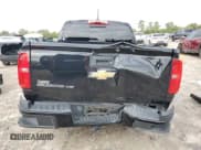 ✅ 2018 Chevrolet Colorado 2WD Z71 • VIN: 1GCGSDEN7J1295162 • Лот: 89855195. Опубликован ранее на Copart с пробегом 120 782 миль. Бесплатный доступ к архиву аукционных продаж из США и подробный отчёт об истории автомобиля на DreamBid. Изображение 6.