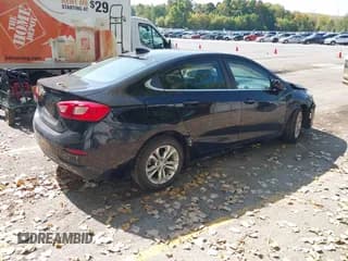 ✅ 2019 Chevrolet Cruze LT • VIN: 1G1BE5SM2K7145275 • Lot: 43248811. Listed on IAAI with 169,876 mi. Free auction sales archive from the USA and detailed vehicle history report at DreamBid. Image 4.