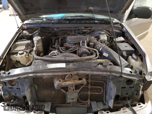 2004 Chevrolet Blazer LS with VIN 1GNDT13X04K101564, listed as a Copart auction lot 80160164 with 249,187 mi miles and Salvage title. Bid and sale history available at DreamBid. Image 13.