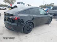 ✅ 2021 Tesla Model Y Standard Range • VIN: 5YJYGDED8MF123246 • Lot: 41291676. Listed on IAAI with 74,630 mi. Free auction sales archive from the USA and detailed vehicle history report at DreamBid. Image 4.