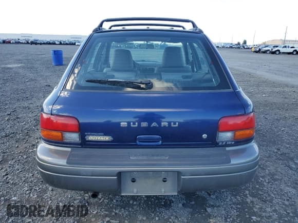 ✅ 1997 Subaru Impreza Outback Special Sports • VIN: JF1GF4858VH810334 • Lot: 82258935. Listed on Copart with 128,224 mi. Free auction sales archive from the USA and detailed vehicle history report at DreamBid. Image 6.