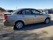 ✅ 2004 Suzuki Forenza S • VIN: KL5JD52Z54K991570 • Lot: 49380694. Wystawiony na Copart z przebiegiem 98 943 mil. Bezpłatny archiwum sprzedaży aukcyjnych z USA i szczegółowy raport historii pojazdu na DreamBid. Zdjęcie 3.