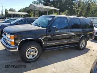 1999 Chevrolet Tahoe Z71 с VIN 1GNEK13R3XJ365011, выставлен на аукционе Copart как лот 87405075 с пробегом 238 678 миль миль и Чистый • Clean title. История ставок и продаж доступна на DreamBid. Изображение 1.