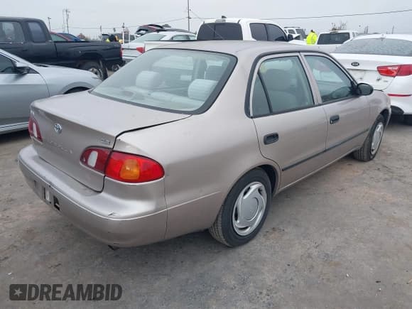 ✅ 1998 Toyota Corolla CE • VIN: 1NXBR12E7WZ076552 • Lot: 43885862. Listed on IAAI with 153,374 mi. Free auction sales archive from the USA and detailed vehicle history report at DreamBid. Image 4.