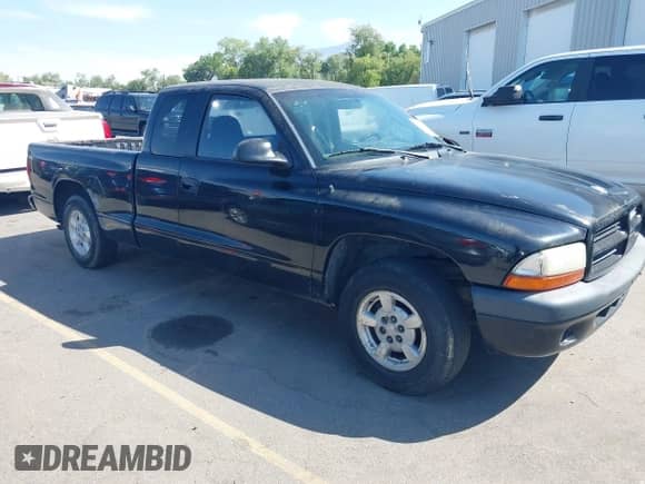 2002 Dodge Dakota Sport z VIN 1B7GL32X52S618892, wystawiony jako IAAI lot #42599446 z przebiegiem 161 214 mil mil oraz . Historia ofert i sprzedaży dostępna na DreamBid. Obrazek 1.