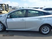 ✅ 2021 Toyota Prius 20th Anniversary Edition • VIN: JTDKAMFU0M3142134 • Lot: 43296259. Listed on IAAI with 65,236 mi. Free auction sales archive from the USA and detailed vehicle history report at DreamBid. Image 15.