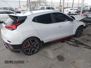 2020 Hyundai Veloster z VIN KMHT36AH6LU008009, wystawiony jako IAAI lot #41775605 z przebiegiem 84 029 mil mil oraz . Historia ofert i sprzedaży dostępna na DreamBid. Obrazek 4.