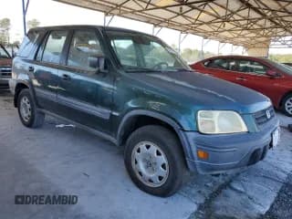 ✅ 1999 Honda CR-V LX • VIN: JHLRD2848XC024802 • Лот: 85060525. Опубликован ранее на Copart с пробегом 194 834 миль. Бесплатный доступ к архиву аукционных продаж из США и подробный отчёт об истории автомобиля на DreamBid. Изображение 4.