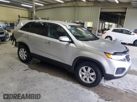 ✅ 2012 Kia Sorento LX • VIN: 5XYKT3A12CG229058 • Lot: 89854405. Listed on Copart with 194,490 mi. Free auction sales archive from the USA and detailed vehicle history report at DreamBid. Image 4.