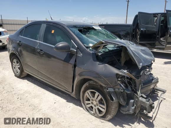 2014 Chevrolet Sonic LT с VIN 1G1JC5SH1E4122774, выставлен на аукционе Copart как лот 61878944 с пробегом Не указан миль и Списание • Salvage title. История ставок и продаж доступна на DreamBid. Изображение 4.