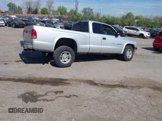 ✅ 2001 Dodge Dakota • VIN: 1B7GG22XX1S348751 • Lot: 42077395. Wystawiony na IAAI z przebiegiem 148 034 mil. Bezpłatny archiwum sprzedaży aukcyjnych z USA i szczegółowy raport historii pojazdu na DreamBid. Zdjęcie 4.
