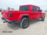 ✅ 2022 Jeep Gladiator Rubicon • VIN: 1C6JJTBG3NL102953 • Lot: 43312000. Listed on IAAI with 57,878 mi. Free auction sales archive from the USA and detailed vehicle history report at DreamBid. Image 4.