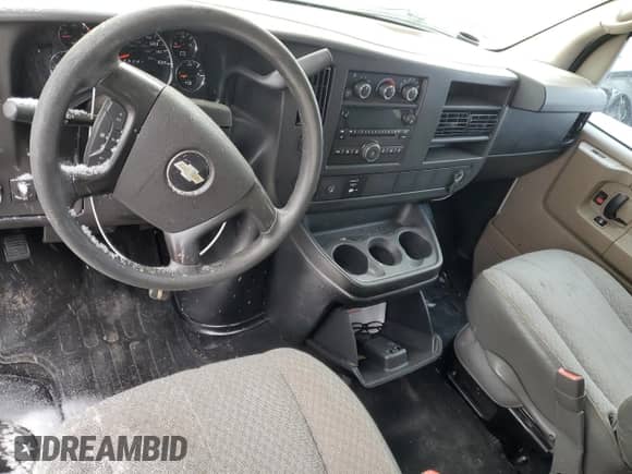 2013 Chevrolet Express Passenger LT с VIN 1GAZG1FG5D1153320, выставлен на аукционе Copart как лот 88986785 с пробегом Не указан миль и Списание • Salvage title. История ставок и продаж доступна на DreamBid. Изображение 8.