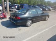 ✅ 2001 Toyota Corolla CE • VIN: 2T1BR12E01C468749 • Lot: 43194503. Listed on IAAI with 122,632 mi. Free auction sales archive from the USA and detailed vehicle history report at DreamBid. Image 4.