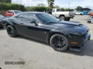 ✅ 2022 Dodge Challenger R/T Scat Pack Widebody • VIN: 2C3CDZFJ0NH218792 • Lot: 48338524. Wystawiony na Copart z przebiegiem 10 651 mil. Bezpłatny archiwum sprzedaży aukcyjnych z USA i szczegółowy raport historii pojazdu na DreamBid. Zdjęcie 4.