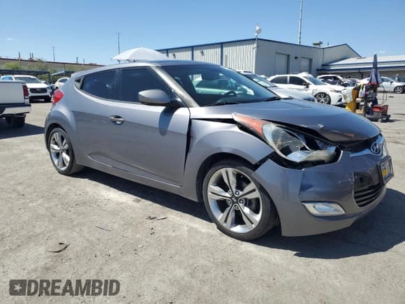✅ 2013 Hyundai Veloster w/Gray Int • VIN: KMHTC6AD6DU157891 • Lot: 68024834. Listed on Copart with 112,561 mi. Free auction sales archive from the USA and detailed vehicle history report at DreamBid. Image 4.