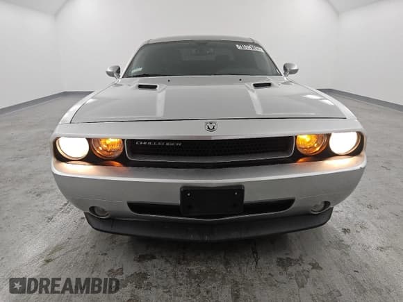 ✅ 2012 Dodge Challenger SXT • VIN: 2C3CDYAG9CH257836 • Lot: 41896165. Wystawiony na Copart z przebiegiem 124 813 mil. Bezpłatny archiwum sprzedaży aukcyjnych z USA i szczegółowy raport historii pojazdu na DreamBid. Zdjęcie 5.