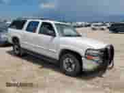 2001 Chevrolet Suburban LT with VIN 3GNGK26G91G239589, listed as a Copart auction lot 61990985 with 218,512 mi miles and Salvage title. Bid and sale history available at DreamBid. Image 4.