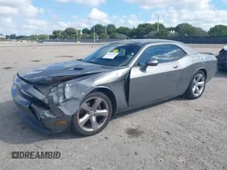 ✅ 2012 Dodge Challenger SXT • VIN: 2C3CDYAG2CH105686 • Lot: 41525994. Wystawiony na IAAI z przebiegiem 130 338 mil. Bezpłatny archiwum sprzedaży aukcyjnych z USA i szczegółowy raport historii pojazdu na DreamBid. Zdjęcie 2.
