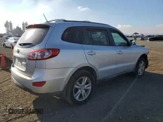 ✅ 2012 Hyundai Santa Fe SE • VIN: 5XYZHDAG9CG150156 • Lot: 80063364. Listed on Copart with 105,370 mi. Free auction sales archive from the USA and detailed vehicle history report at DreamBid. Image 3.