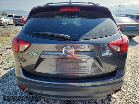 ✅ 2014 Mazda CX-5 Sport • VIN: JM3KE2BE4E0414573 • Лот: 80656255. Опубликован ранее на Copart с пробегом 135 499 миль. Бесплатный доступ к архиву аукционных продаж из США и подробный отчёт об истории автомобиля на DreamBid. Изображение 6.