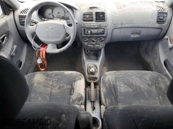 2004 Hyundai Accent GL с VIN KMHCG35C84U284632, выставлен на аукционе Copart как лот 67440585 с пробегом Не указан миль и Чистый • Clean title. История ставок и продаж доступна на DreamBid. Изображение 8.