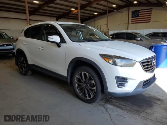 ✅ 2016 Mazda CX-5 Grand Touring • VIN: JM3KE2DY3G0768255 • Lot: 81627985. Listed on Copart with 76,407 mi. Free auction sales archive from the USA and detailed vehicle history report at DreamBid. Image 4.