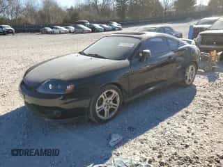 2006 Hyundai Tiburon GS с VIN KMHHM65D16U192869, выставлен на аукционе Copart как лот 47084065 с пробегом 169 919 миль миль и Списание • Salvage title. История ставок и продаж доступна на DreamBid. Изображение 1.