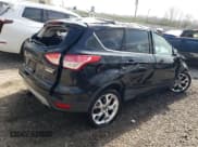 ✅ 2013 Ford Escape Titanium • VIN: 1FMCU0J96DUB77063 • Lot: 47002334. Listed on Copart with 244,499 mi. Free auction sales archive from the USA and detailed vehicle history report at DreamBid. Image 3.