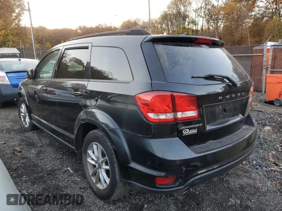 ✅ 2014 Dodge Journey SXT • VIN: 3C4PDCBG9ET148155 • Лот: 90820735. Опубликован ранее на Copart с пробегом 128 464 миль. Бесплатный доступ к архиву аукционных продаж из США и подробный отчёт об истории автомобиля на DreamBid. Изображение 2.