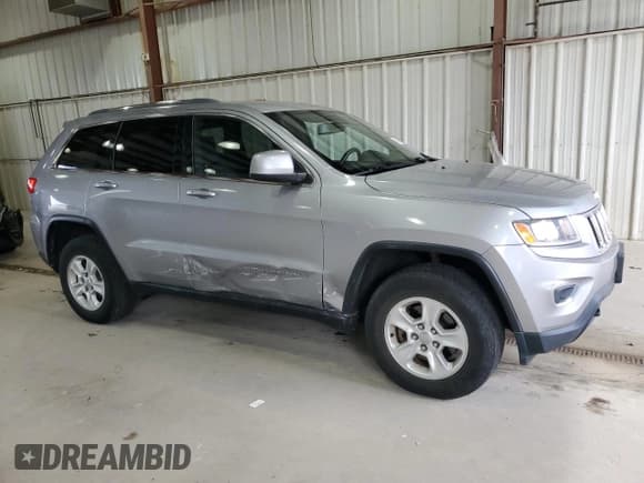 ✅ 2015 Jeep Grand Cherokee Laredo • VIN: 1C4RJFAG0FC834764 • Lot: 82690815. Listed on Copart with 67,519 mi. Free auction sales archive from the USA and detailed vehicle history report at DreamBid. Image 4.